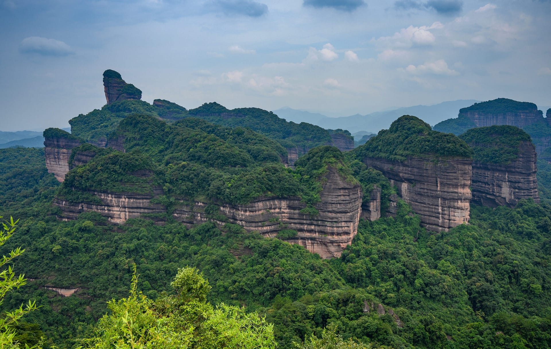 Mount Danxia red sandstone cliffs in Shaoguan, Guangdong, China — UNESCO World Heritage geological park