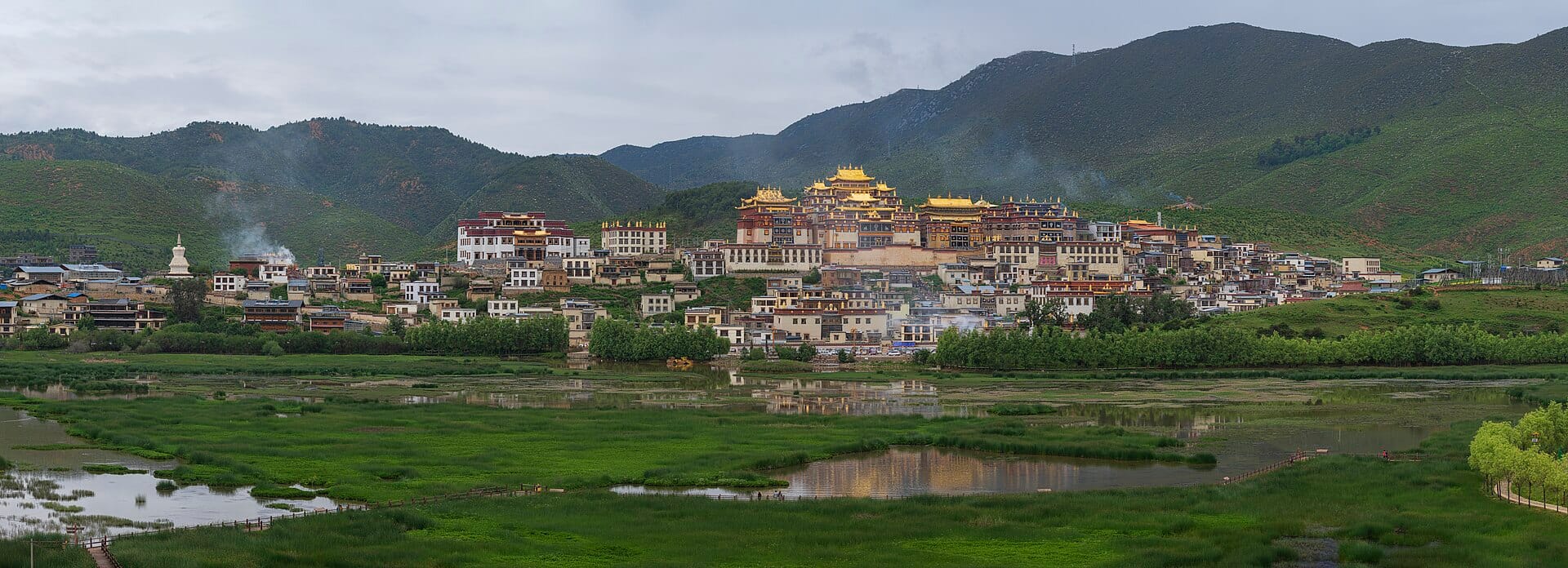 Songzanlin Monastery and its lake reflection, the Little Potala Palace of Yunnan, in Shangri-La
